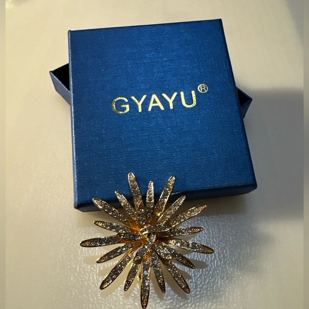GYAYU Gold Starburst Crystal Rhinestone Brooch Pin Statement Piece